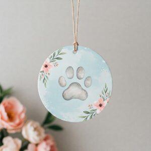 Gentle illustration of a paw print memorial ornament, a touching keepsake for remembering a beloved dog.