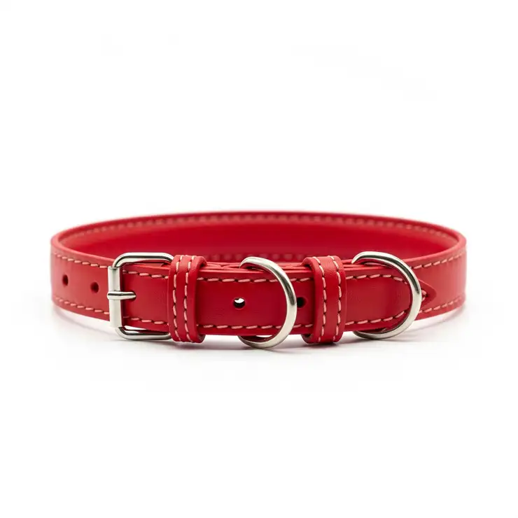 A classic red dog collar displayed on a clean white background, showcasing its vibrant color and design.