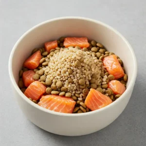 A nutritious bowl of salmon and rice dog food, perfect for sensitive stomachs and healthy coats.