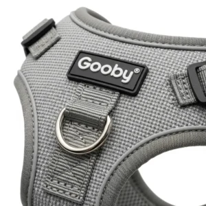 Close-up showing the secure D-ring placement on a Gooby dog harness for leash attachment.
